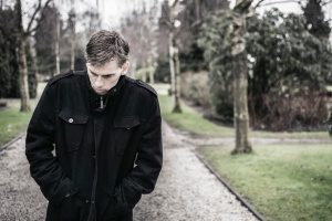 man walking with a suspended license who is thinking of obtaining a restricted license