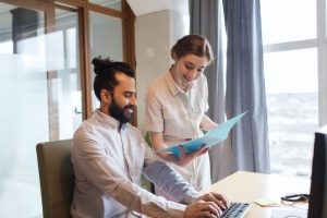 two coworkers excited about learning their workplace discrimination laws