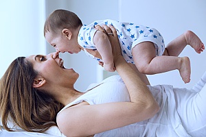 a mother and her newly adopted baby that are able to spend time together since her employer must legally allow maternity leave for adoption