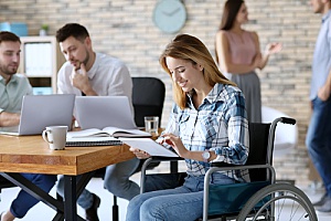 a woman who is working for her company after suffering a disability and is therefore not facing disability discrimination