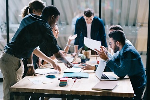 bunch of employees seeing why they should consider hiring an employment law attorney