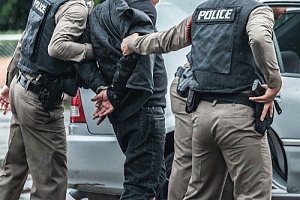 a man going through an unlawful arrest as a result of police excessive force