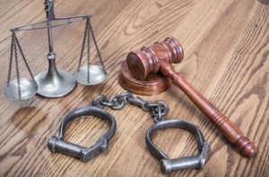 Law Scales, Judge's Gavel and Handcuffs