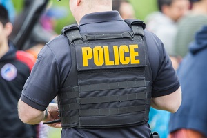 police jacket on the back of policeman