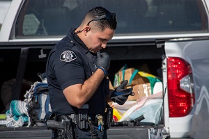 officers from the City of Ventura Police Department conduct a search