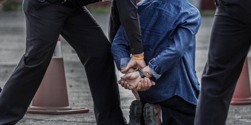 police officers arresting a man