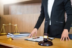 Law consultant standing at his desk