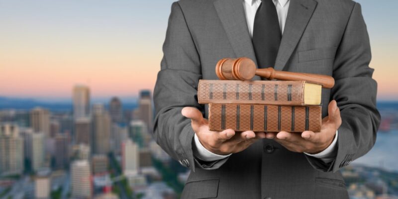 lawyer with gavel and books