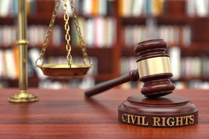 A judges gavel and a weight scale that indicates civil rights